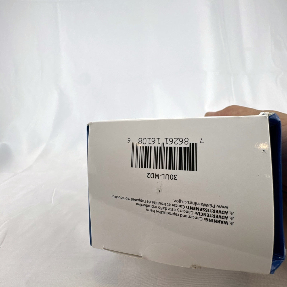 TORK 652B black outdoor photocell light timer with dual grounded outlets in its original packaging.