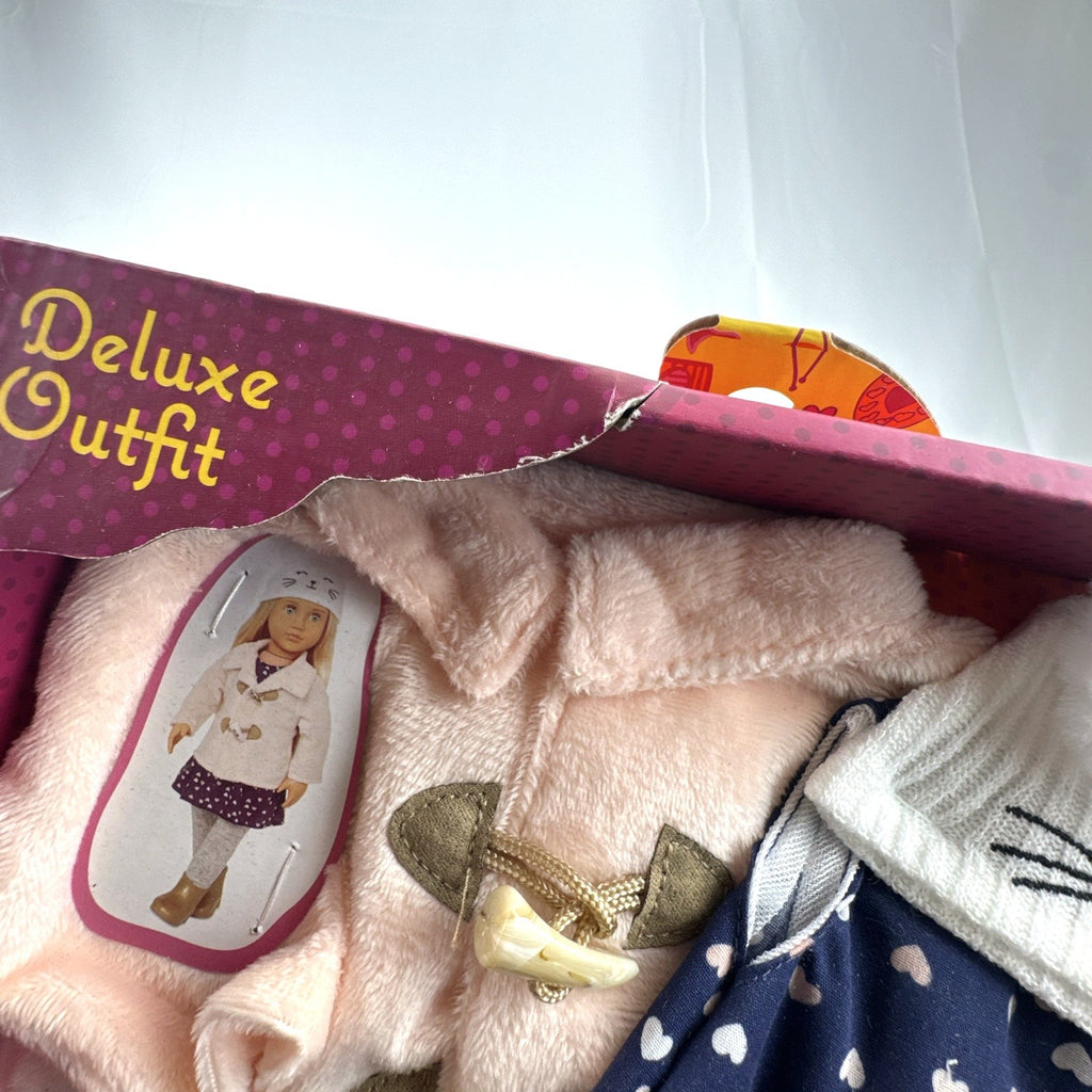 Our Generation Cheerfully Chilly 5-piece winter coat and dress outfit set for 18-inch dolls in packaging
