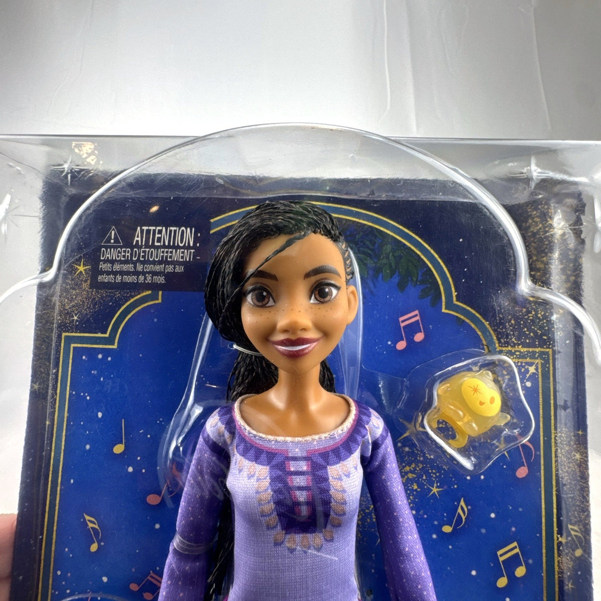 Mattel Disney Wish singing Asha doll in purple dress with companion Star figure in original packaging