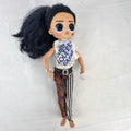 MGA L.O.L. Surprise! O.M.G. Remix Rocker Boi 10-inch articulated male fashion doll in graphic outfit