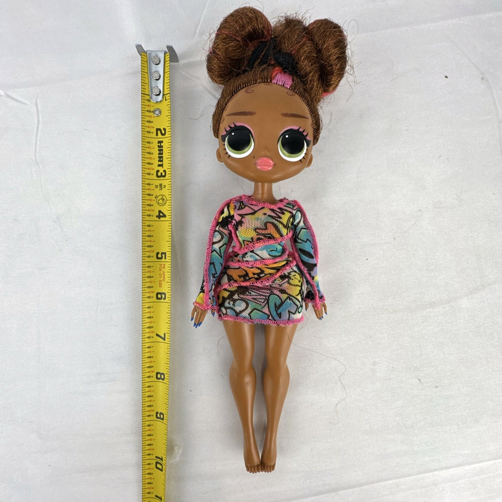 MGA L.O.L. Surprise! O.M.G. 10-inch 24K D.J. Winter Disco fashion doll wearing her graffiti-print dress