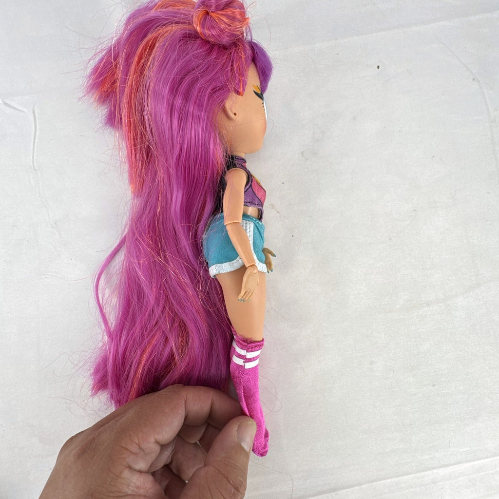MGA LOL Surprise OMG Roller Chick 10-inch articulated fashion doll with pink hair in retro outfit