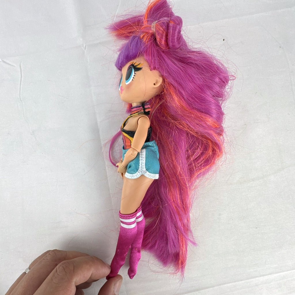 MGA LOL Surprise OMG Roller Chick 10-inch articulated fashion doll with pink hair in retro outfit