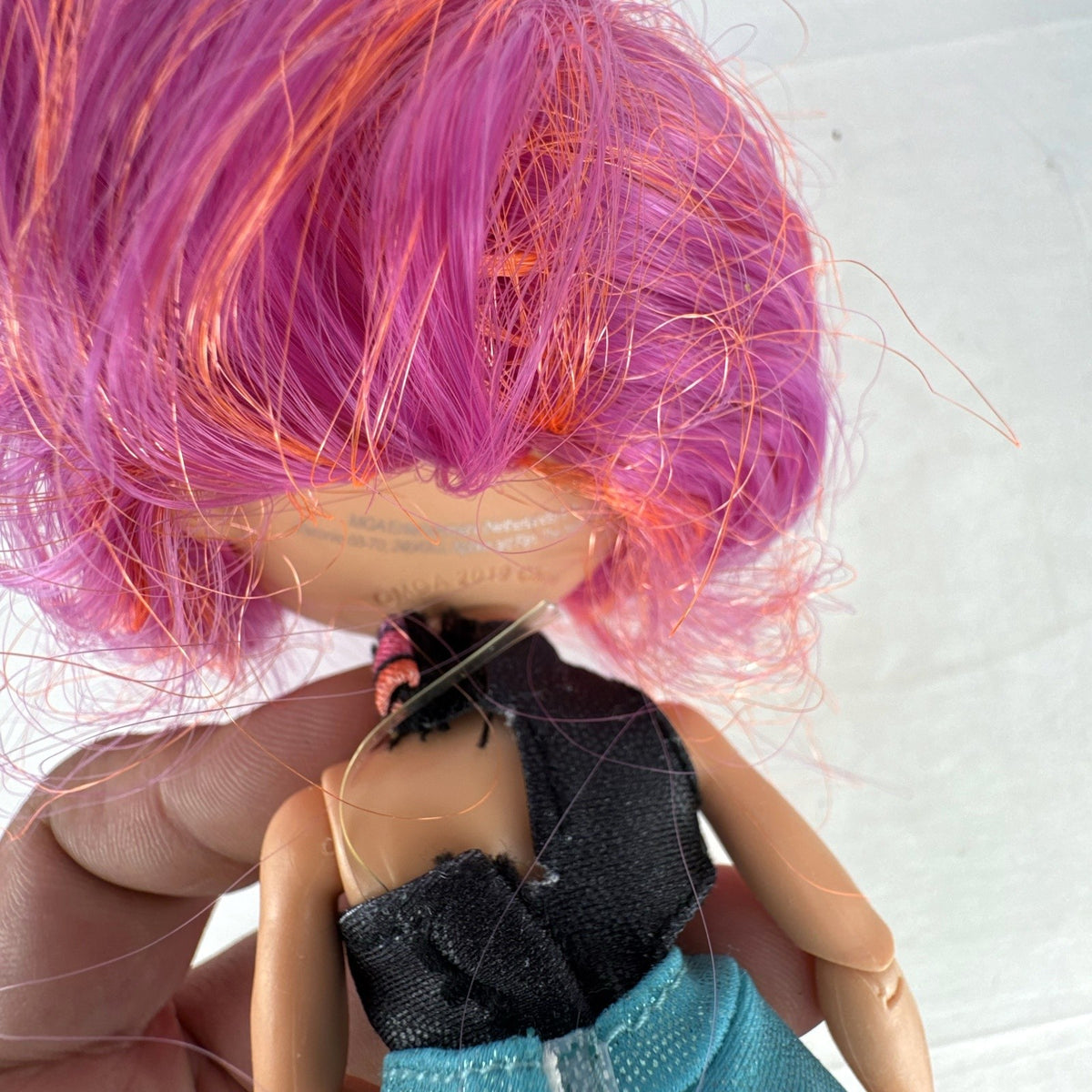 MGA LOL Surprise OMG Roller Chick 10-inch articulated fashion doll with pink hair in retro outfit
