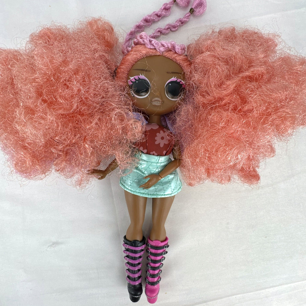 MGA L.O.L. Surprise! O.M.G. Queens Miss Divine 10-inch doll with pink curls, floral top, and metallic skirt