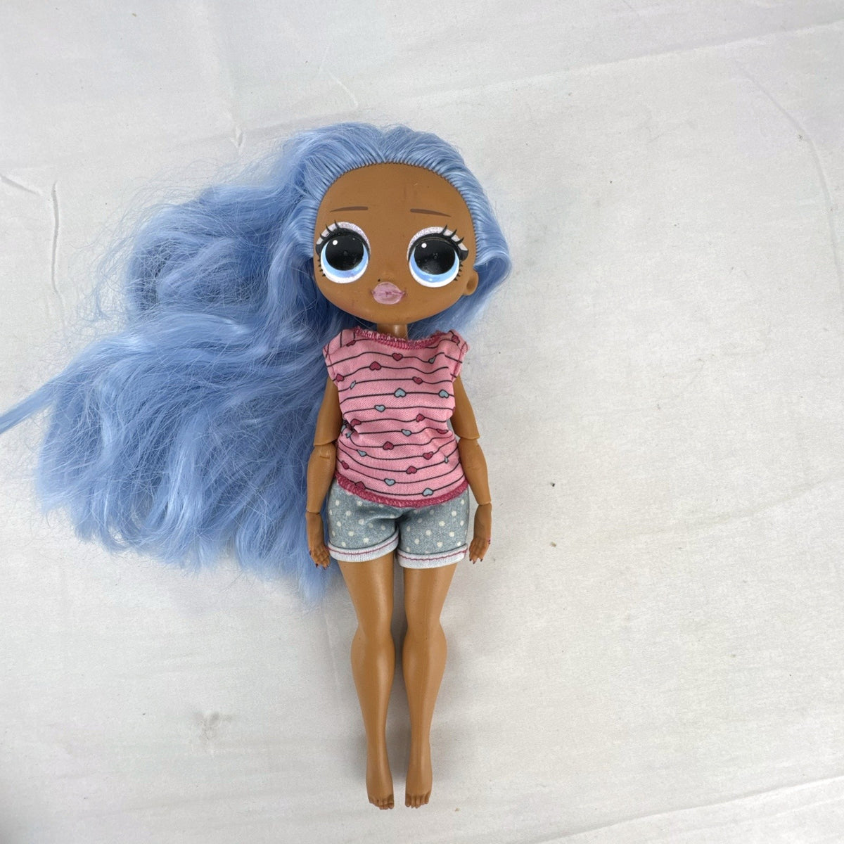 MGA Entertainment L.O.L. Surprise! O.M.G. 10-inch articulated fashion doll with wavy blue hair
