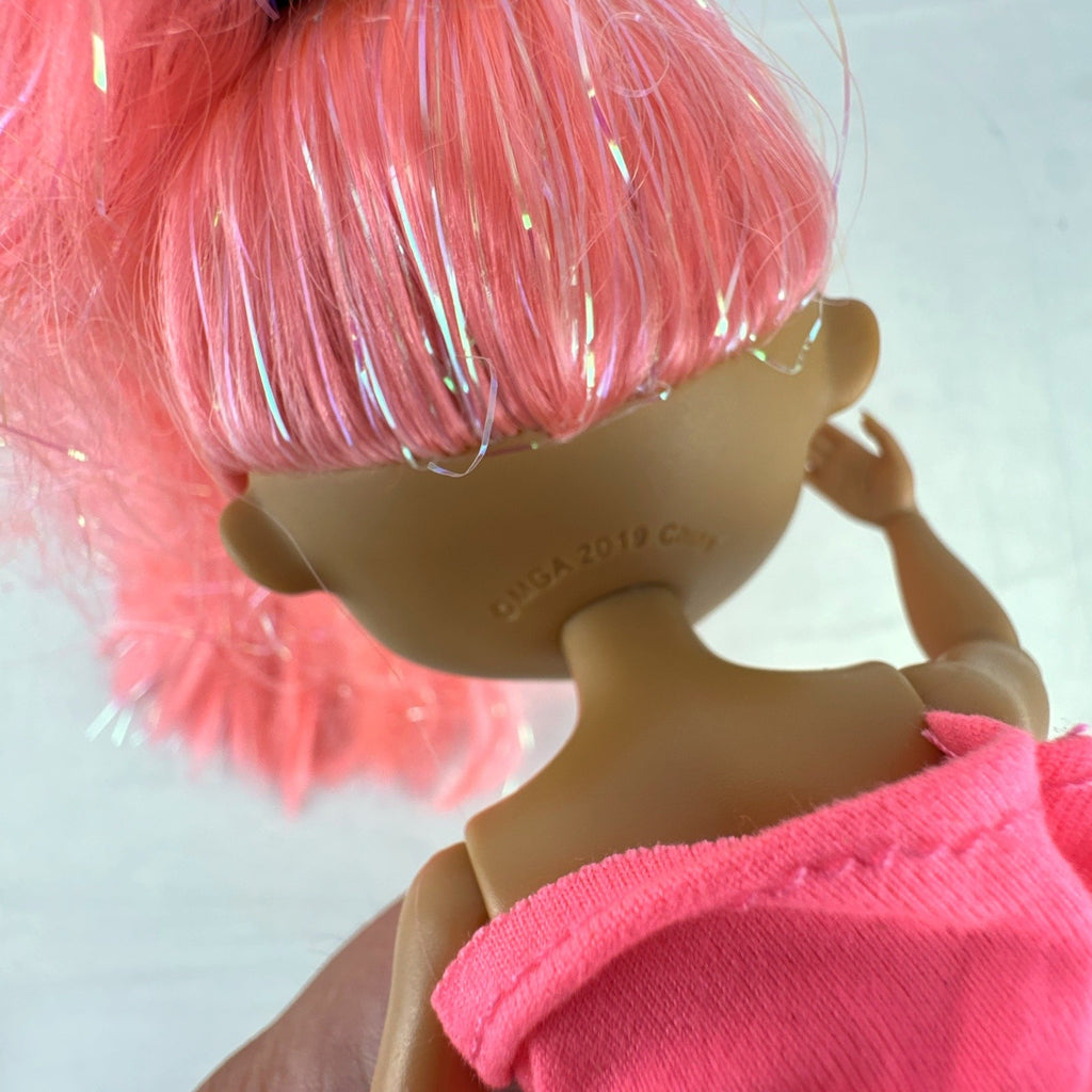 MGA L.O.L. Surprise! O.M.G. Lights Dazzle fashion doll with neon pink tinsel hair and platform sneakers.