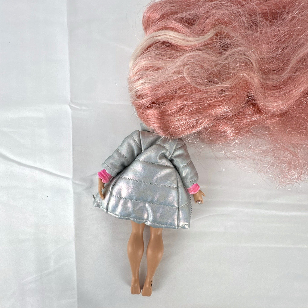MGA L.O.L. Surprise O.M.G. Cosmic Nova doll in silver puffer jacket with pink crimped hair