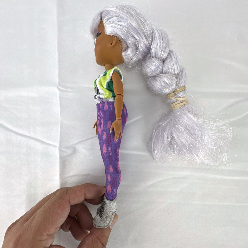 L.O.L. Surprise! O.M.G. Cosmic Nova 10-inch Winter Disco fashion doll with silver tinsel braid and glitter boots