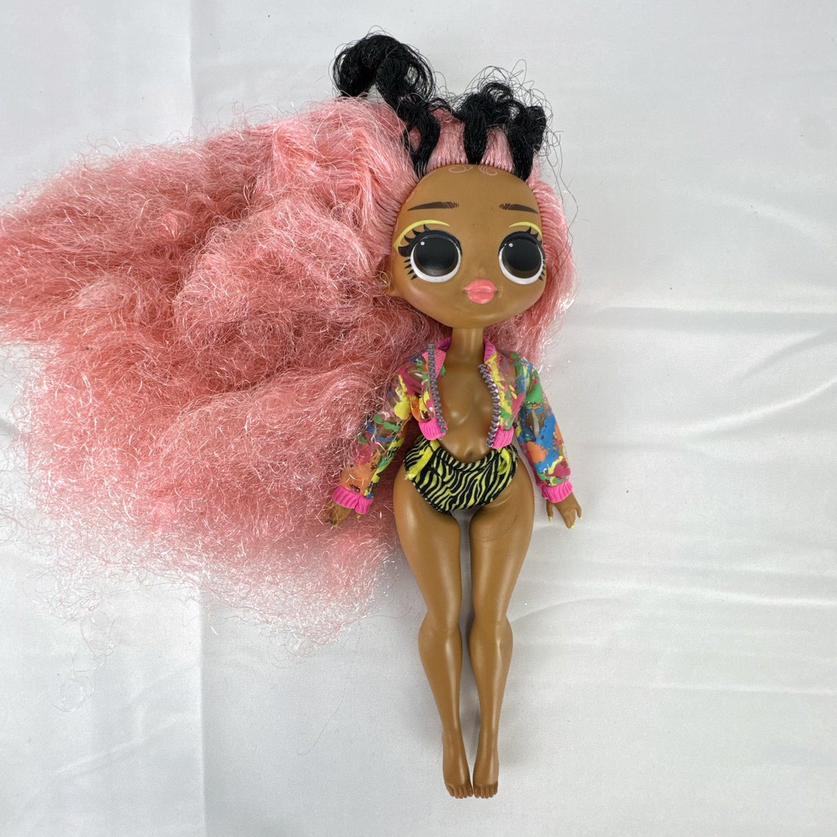 MGA L.O.L. Surprise! O.M.G. Neonlicious fashion doll with crimped pink hair and cropped jacket