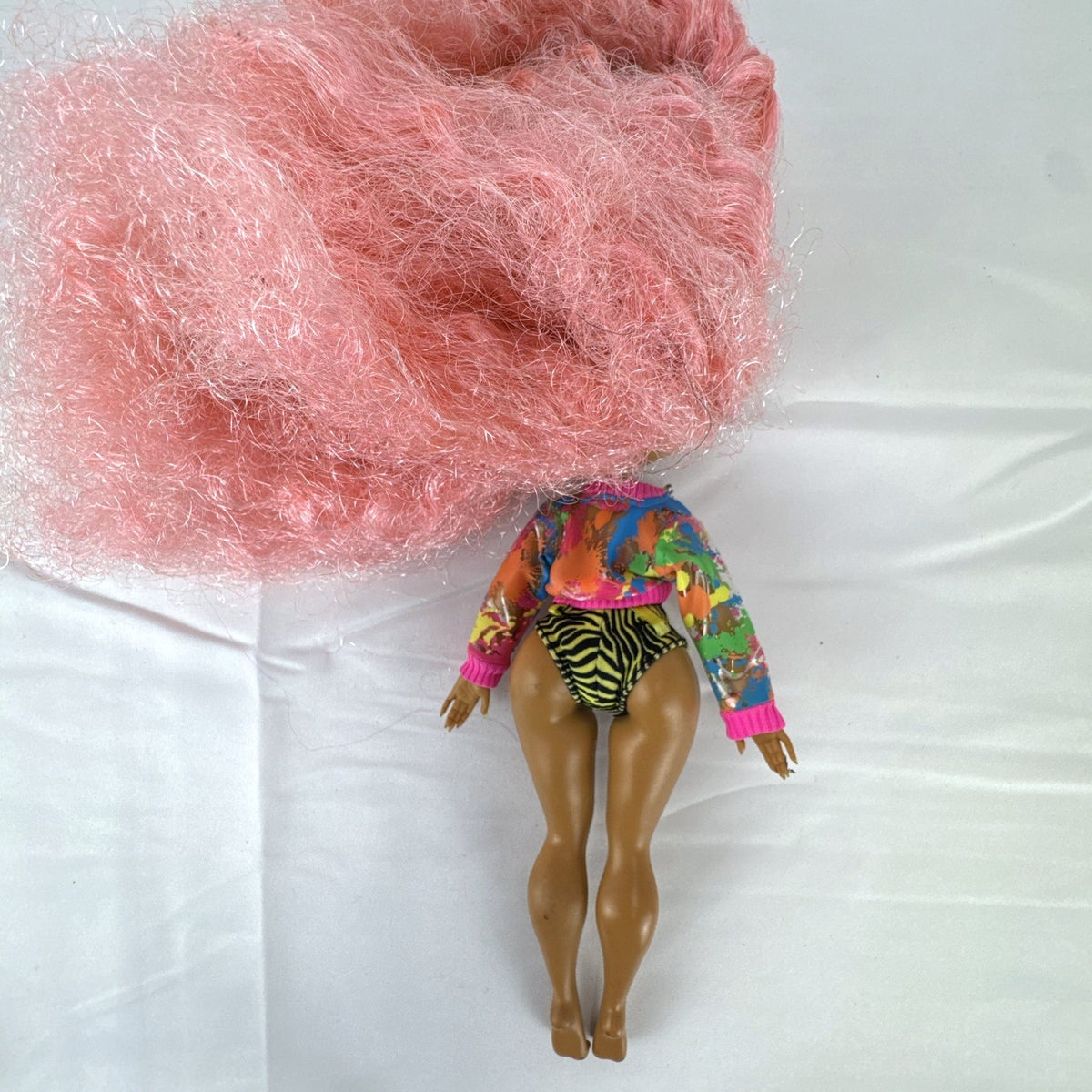MGA L.O.L. Surprise! O.M.G. Neonlicious fashion doll with crimped pink hair and cropped jacket