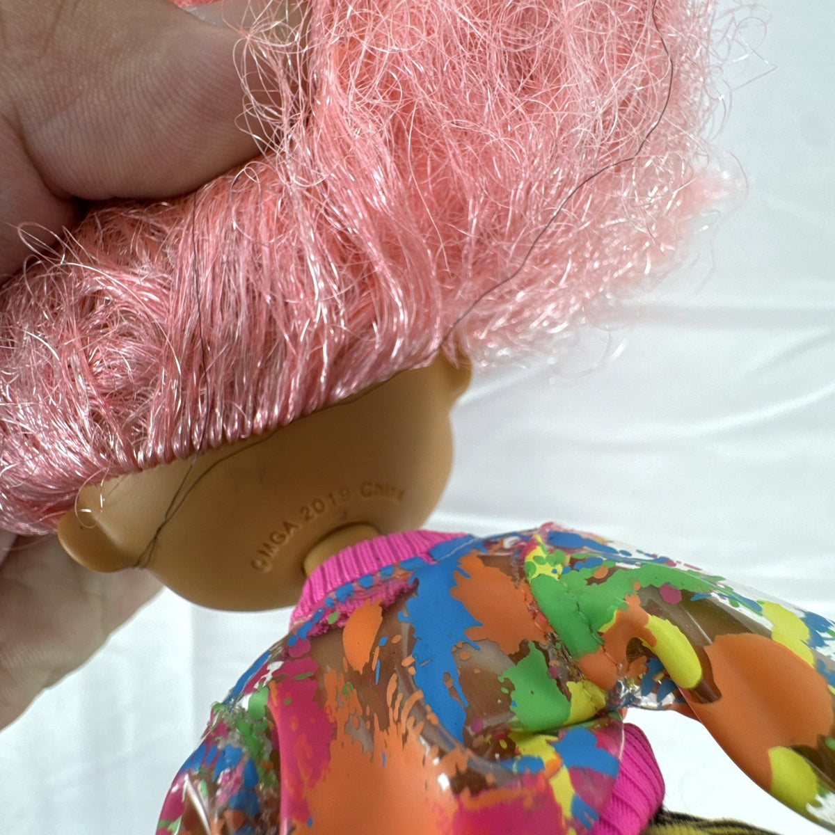 MGA L.O.L. Surprise! O.M.G. Neonlicious fashion doll with crimped pink hair and cropped jacket