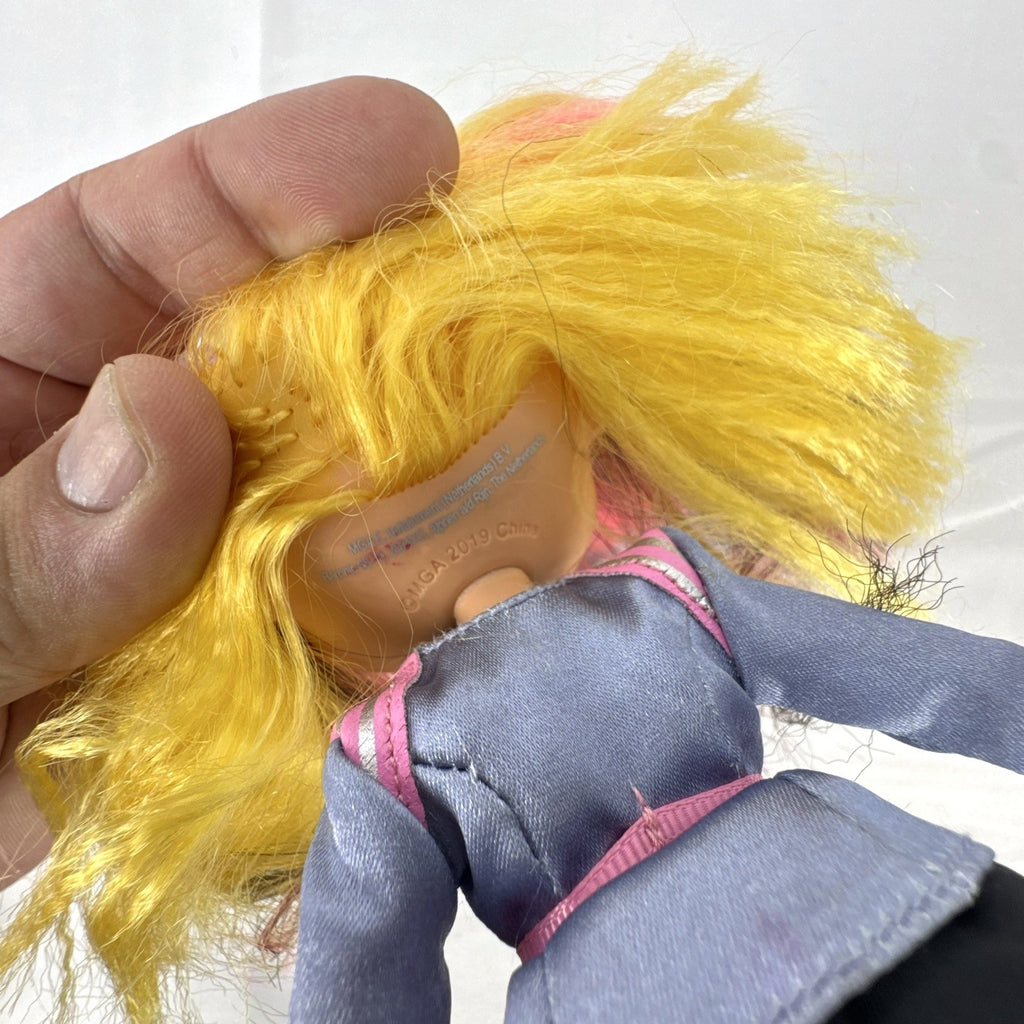 MGA L.O.L. Surprise! O.M.G. Neonlicious 10-inch doll in gray cropped jacket and black shorts.