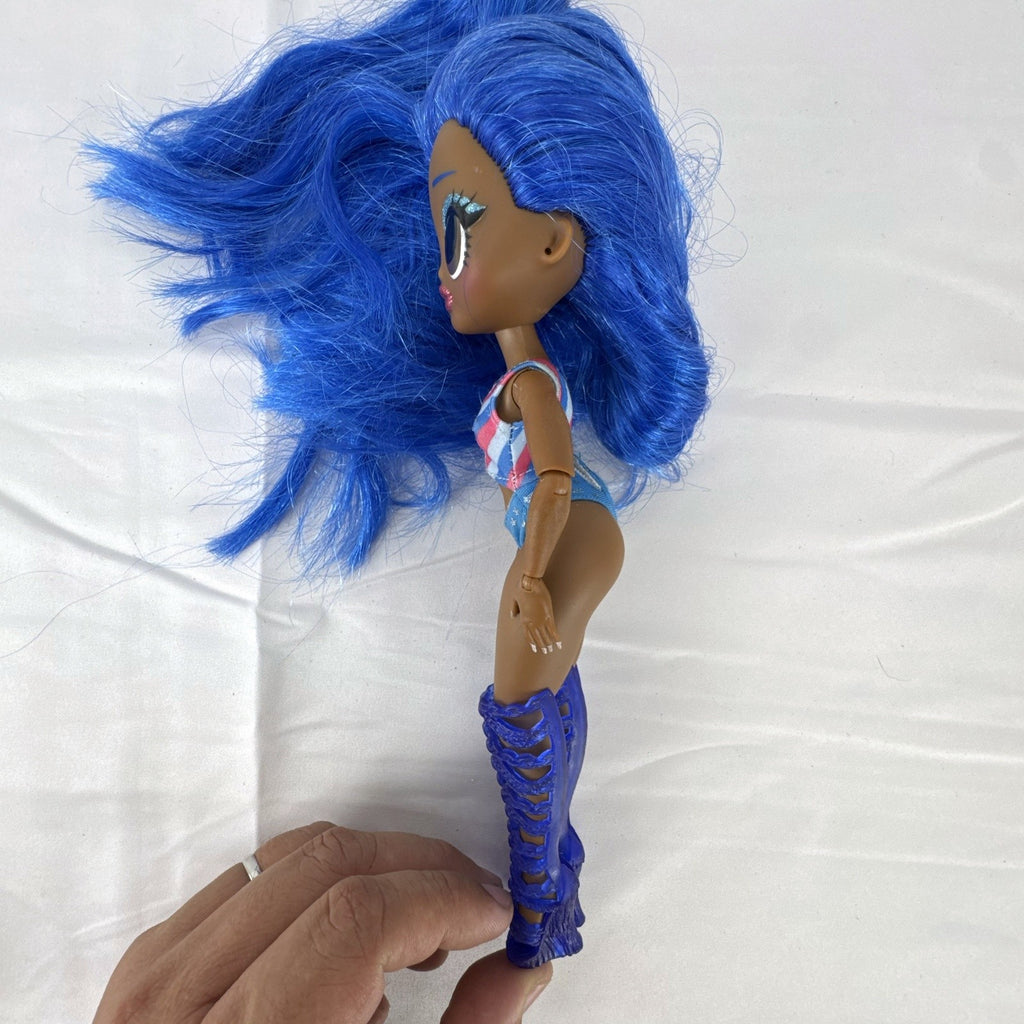 MGA LOL Surprise OMG Miss Independent fashion doll with long blue hair, swimsuit, and gladiator boots