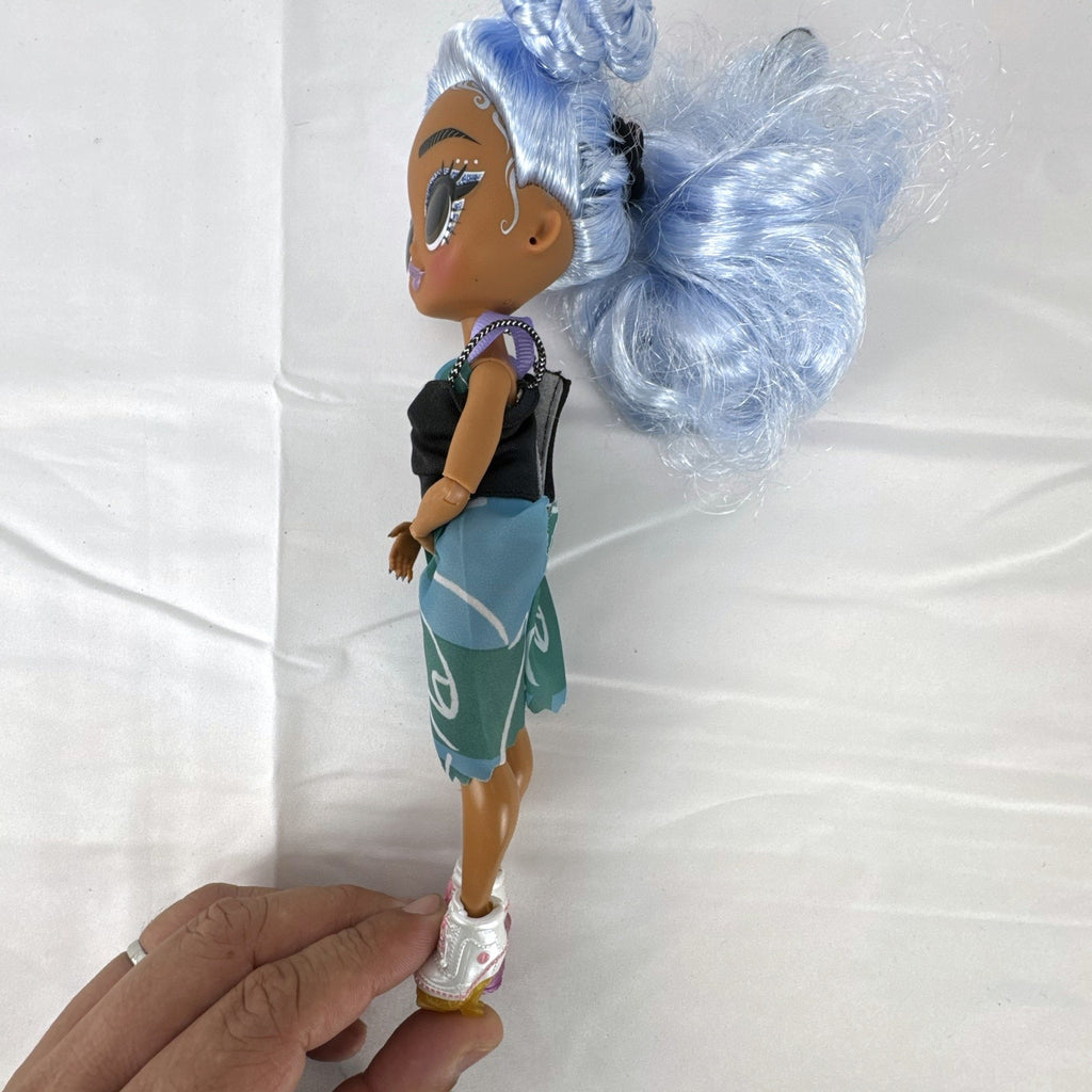 MGA Entertainment LOL Surprise OMG Skatepark Q.T. 10-inch fashion doll with blue space buns and roller skates