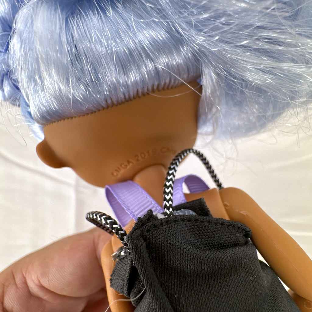 MGA Entertainment LOL Surprise OMG Skatepark Q.T. 10-inch fashion doll with blue space buns and roller skates