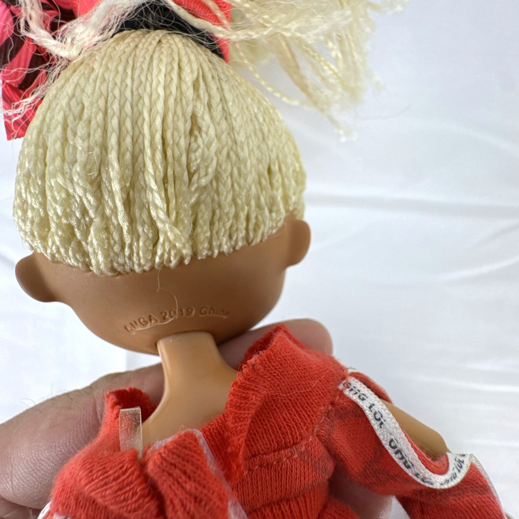 L.O.L. Surprise! O.M.G. Series 1 Swag fashion doll in red tracksuit with blonde micro braids