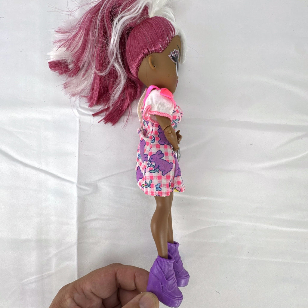 MGA LOL Surprise OMG Spirit Queen doll with two-tone pink and white hair, spiderweb makeup, and purple boots