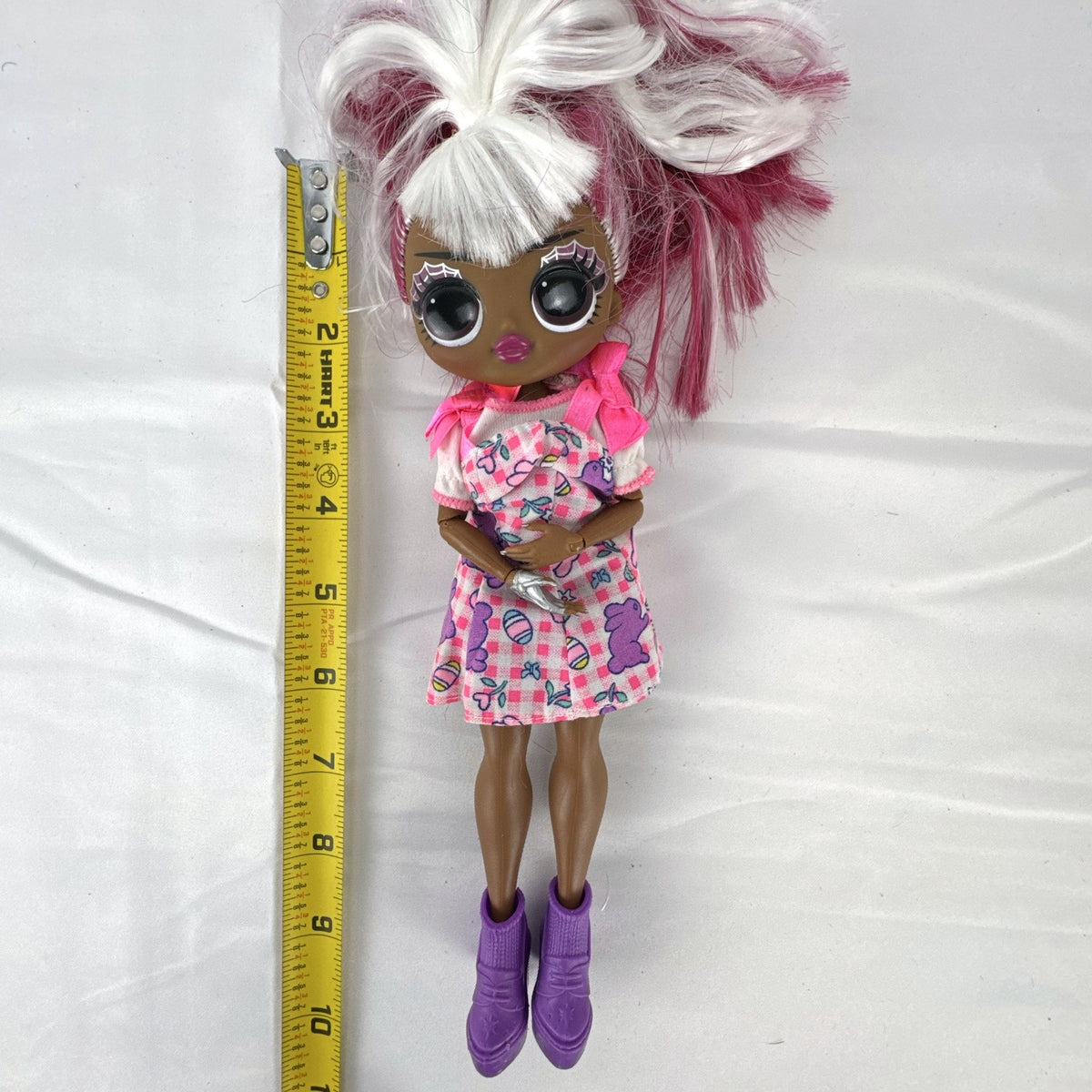 MGA LOL Surprise OMG Spirit Queen doll with two-tone pink and white hair, spiderweb makeup, and purple boots