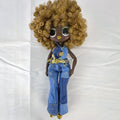 MGA L.O.L. Surprise! O.M.G. Series 3 Da Boss 10-inch doll in patchwork denim jumpsuit with blonde afro