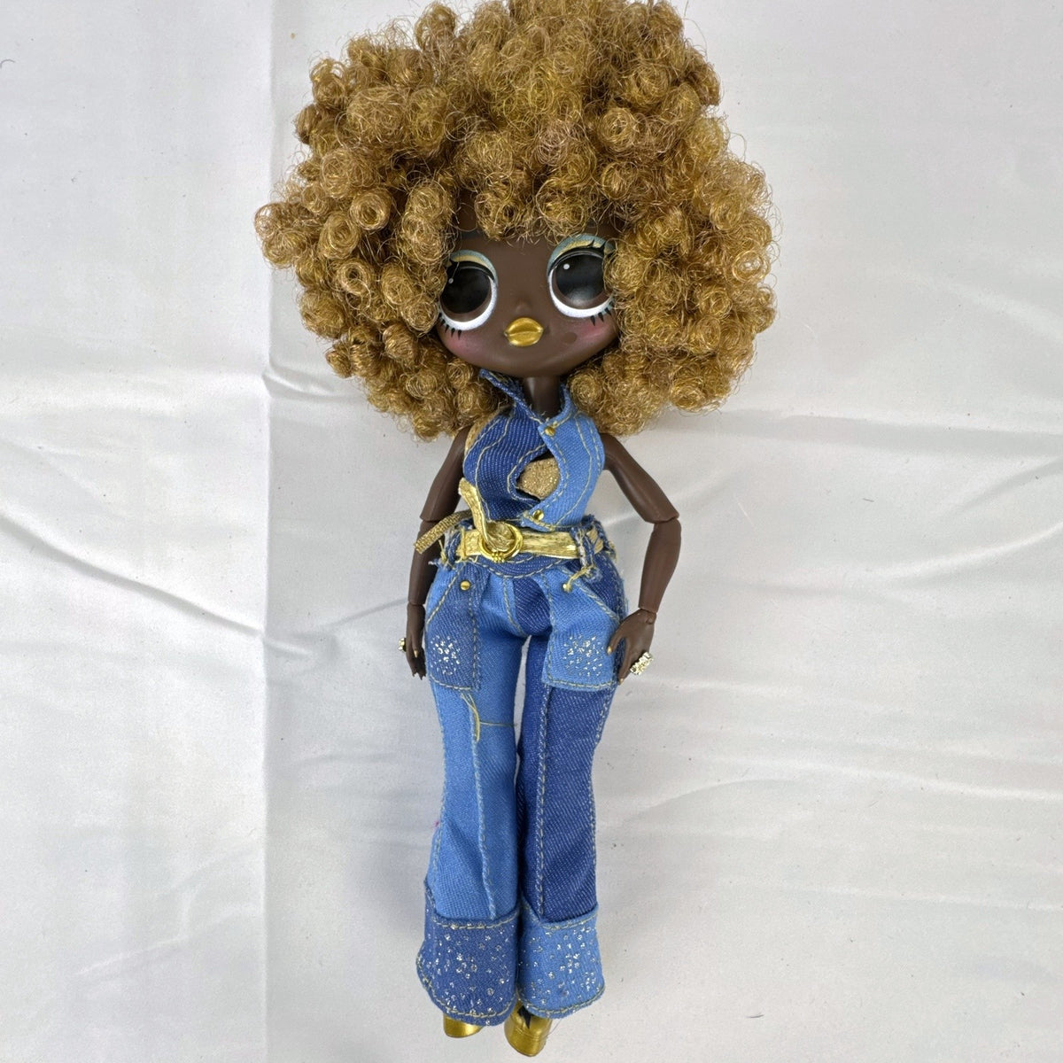 MGA L.O.L. Surprise! O.M.G. Series 3 Da Boss 10-inch doll in patchwork denim jumpsuit with blonde afro