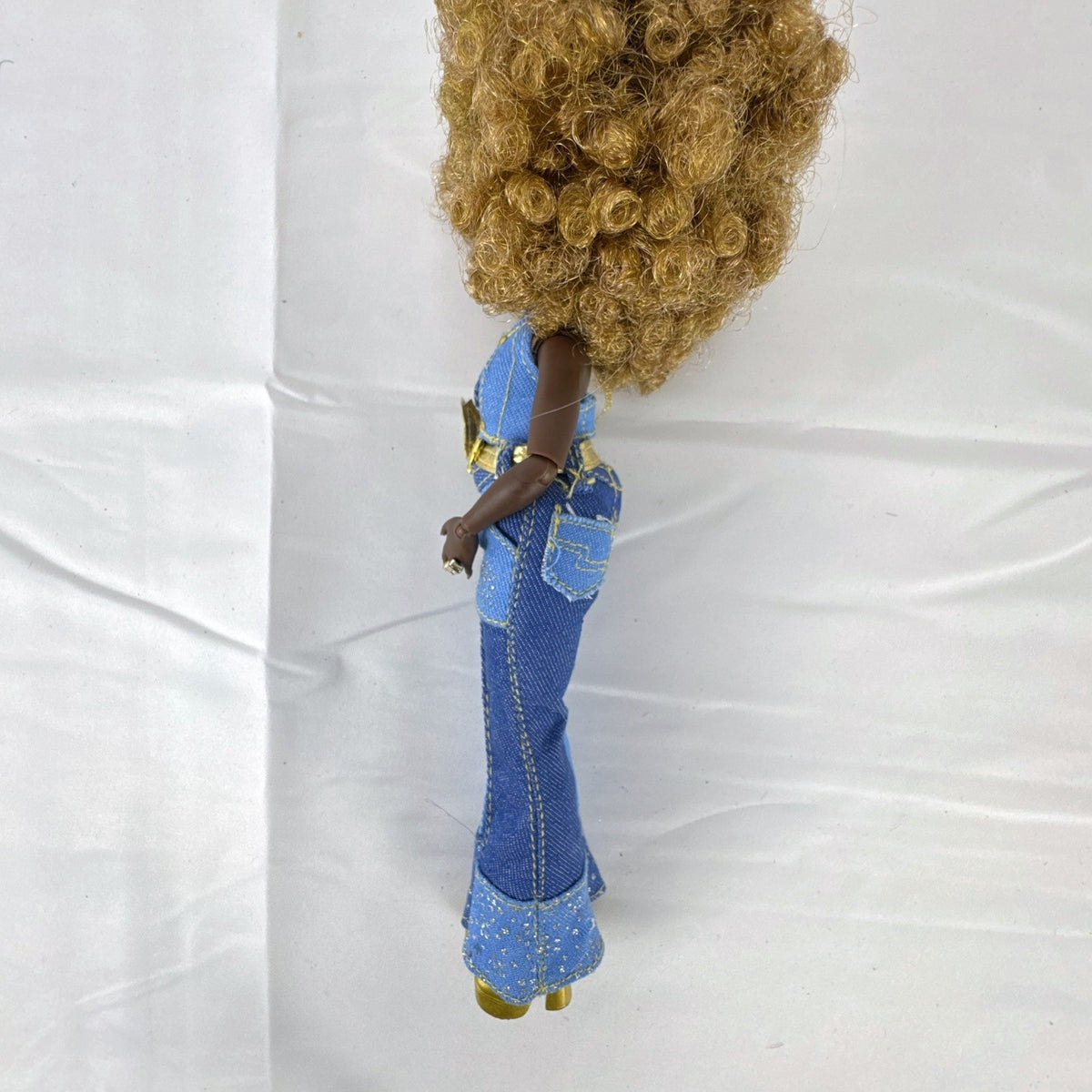 MGA L.O.L. Surprise! O.M.G. Series 3 Da Boss 10-inch doll in patchwork denim jumpsuit with blonde afro