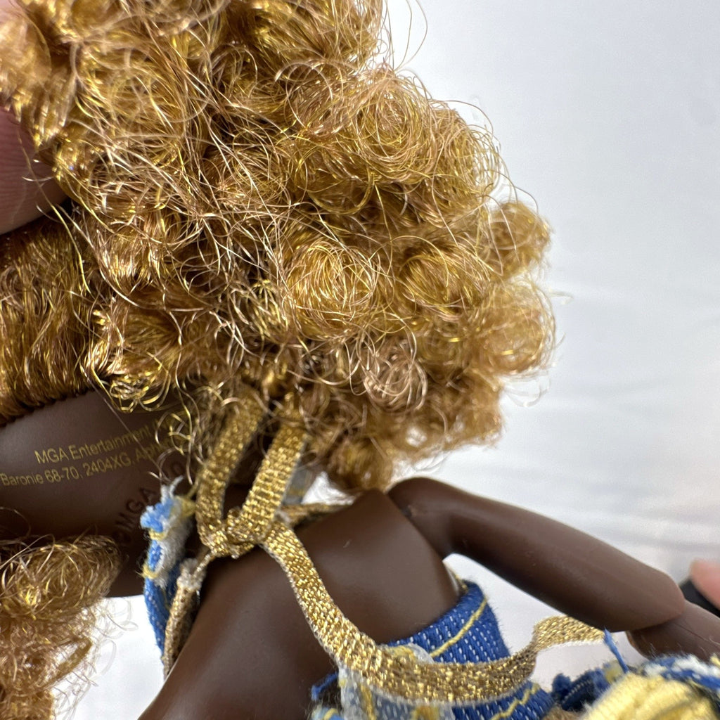 MGA L.O.L. Surprise! O.M.G. Series 3 Da Boss 10-inch doll in patchwork denim jumpsuit with blonde afro