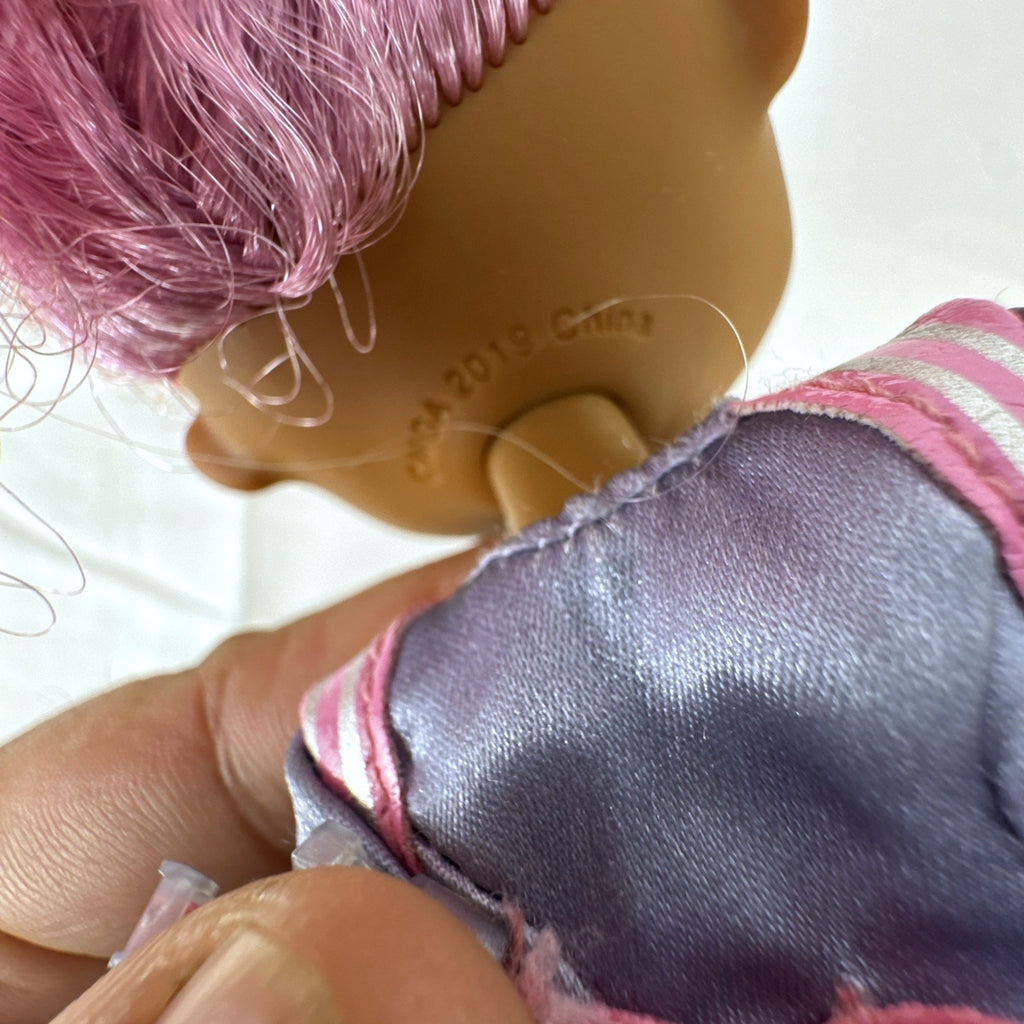 MGA Entertainment L.O.L. Surprise! O.M.G. Da Boss fashion doll with pink curly afro and yellow boots