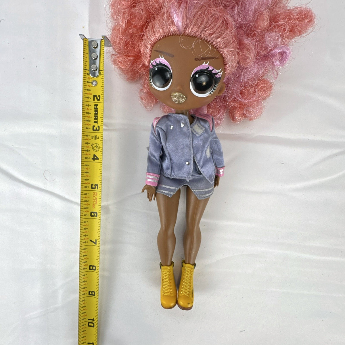 MGA Entertainment L.O.L. Surprise! O.M.G. Da Boss fashion doll with pink curly afro and yellow boots