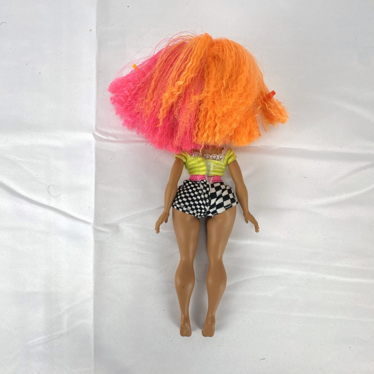 MGA L.O.L. Surprise! O.M.G. Neonlicious 10-inch swim fashion doll with two-tone neon crimped hair