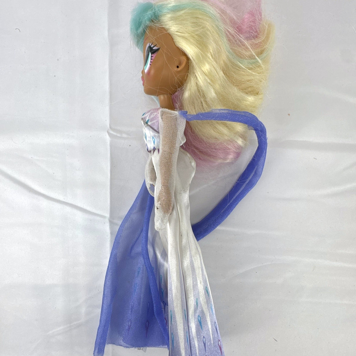 MGA Entertainment LOL Surprise OMG Candylicious doll wearing a Disney Frozen Elsa gown