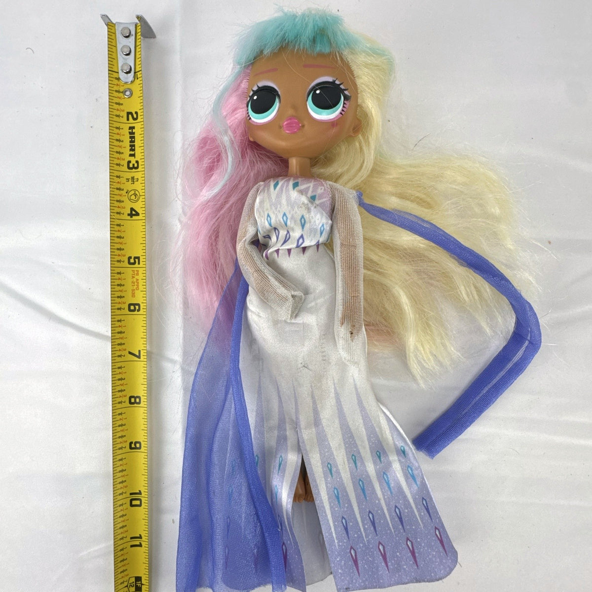 MGA Entertainment LOL Surprise OMG Candylicious doll wearing a Disney Frozen Elsa gown
