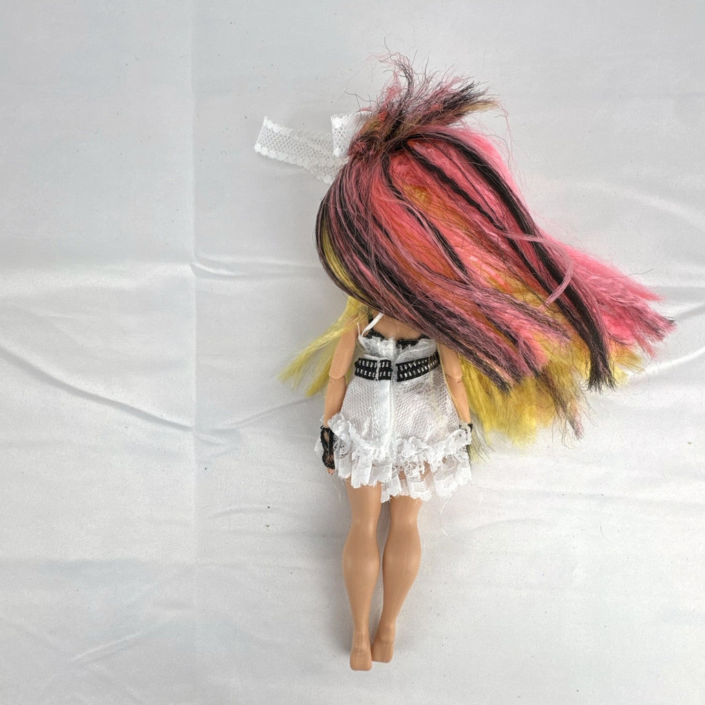 MGA L.O.L. Surprise! O.M.G. Remix Pop B.B. 10-inch fashion doll in white lace dress with tricolor hair