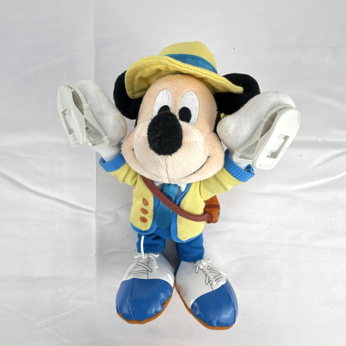 Tokyo Disney Resort Vacation Packages Mickey Mouse 9.5 inch plush keychain with hand clips in yellow travel outfit