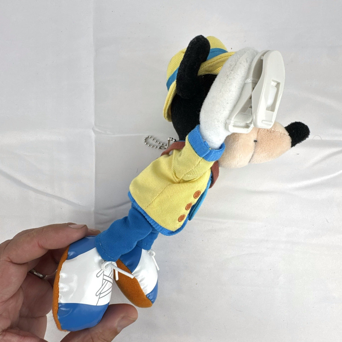 Tokyo Disney Resort Vacation Packages Mickey Mouse 9.5 inch plush keychain with hand clips in yellow travel outfit