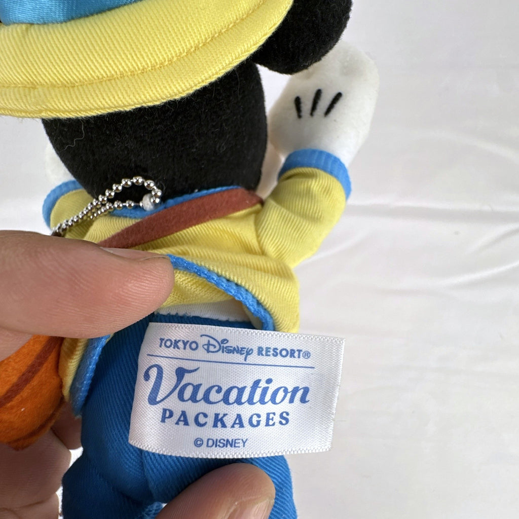 Tokyo Disney Resort Vacation Packages Mickey Mouse 9.5 inch plush keychain with hand clips in yellow travel outfit