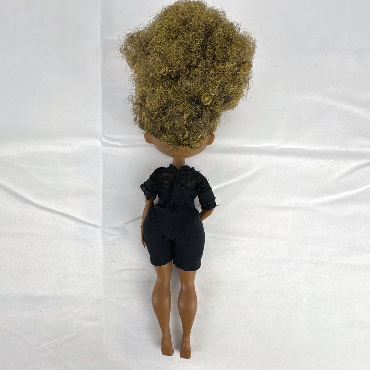 MGA Entertainment L.O.L. Surprise! O.M.G. Series 1 Royal Bee fashion doll with curly afro in black bodysuit