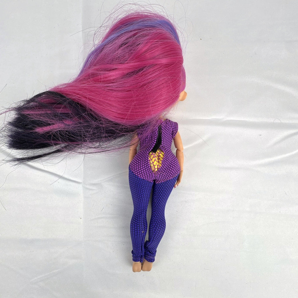 MGA Entertainment LOL Surprise OMG Ms. Direct 10-inch fashion doll wearing purple lightning bolt bodysuit