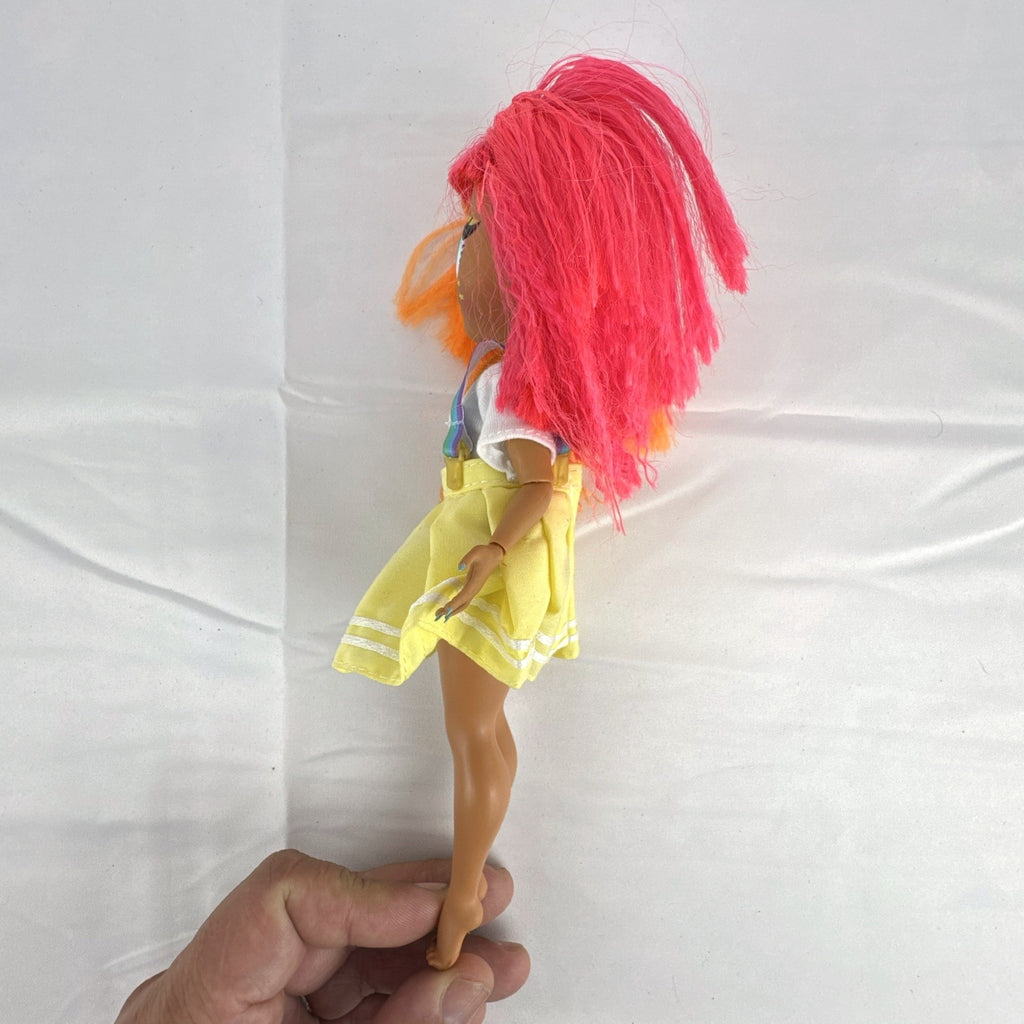 MGA LOL Surprise OMG Neonlicious fashion doll with split neon orange and pink hair and pleated skirt