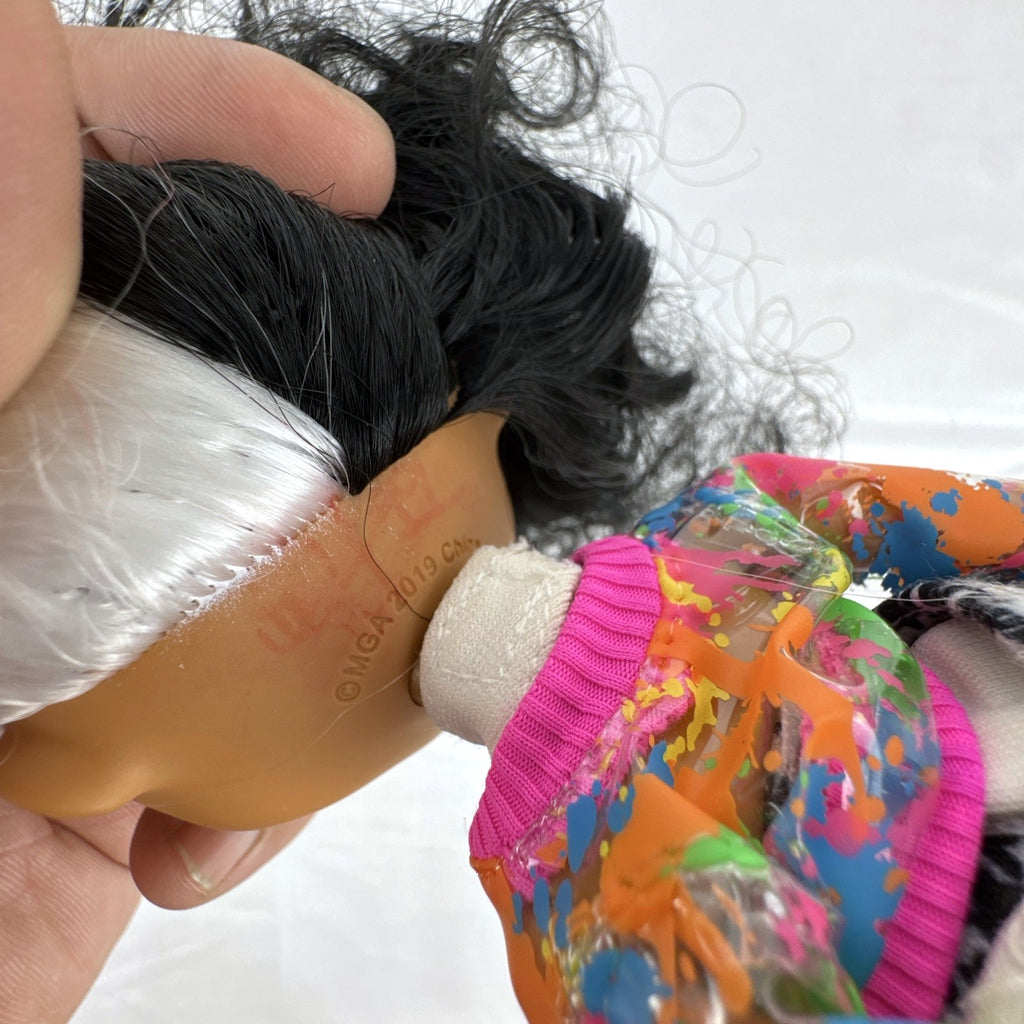 MGA L.O.L. Surprise! O.M.G. 10-inch fashion doll with split black and white curly hair in houndstooth outfit