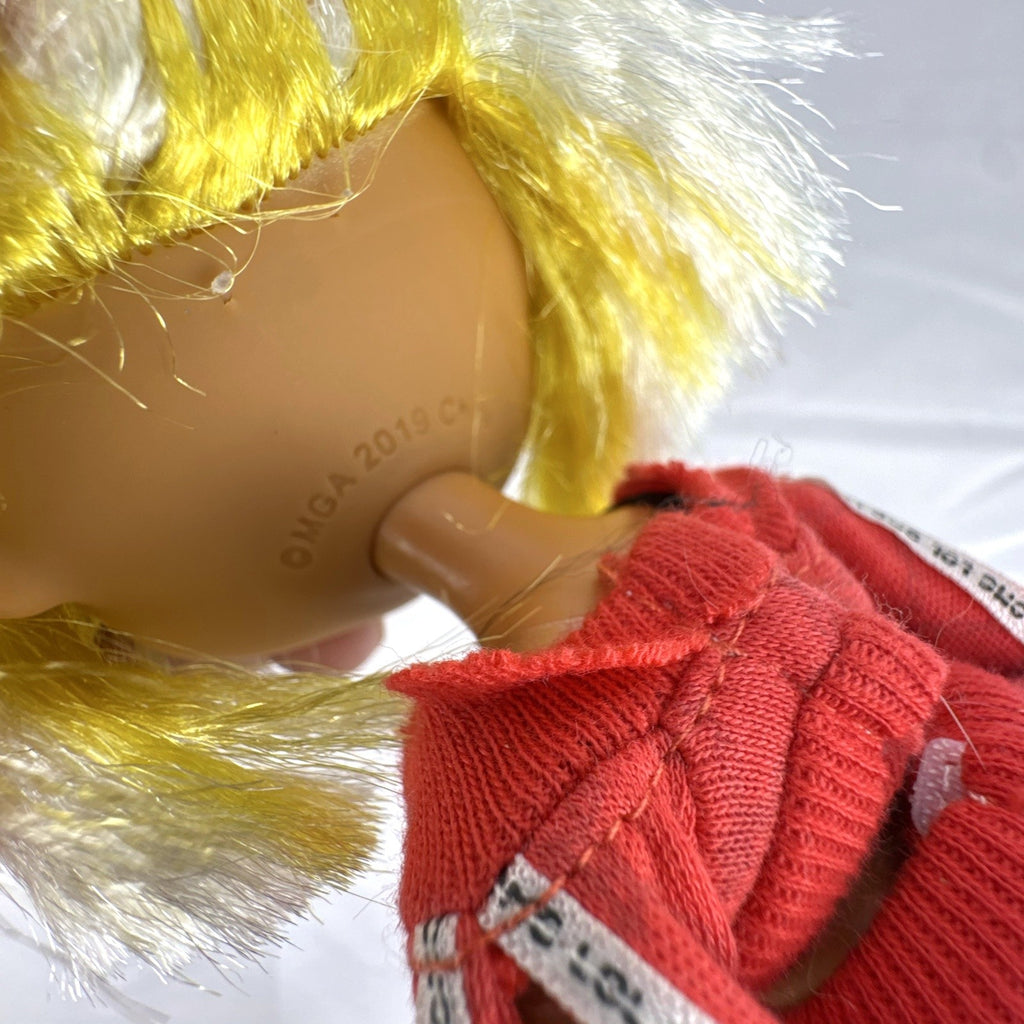 MGA L.O.L. Surprise! O.M.G. Lights Speedster 10-inch fashion doll wearing red tracksuit with blonde and neon yellow hair