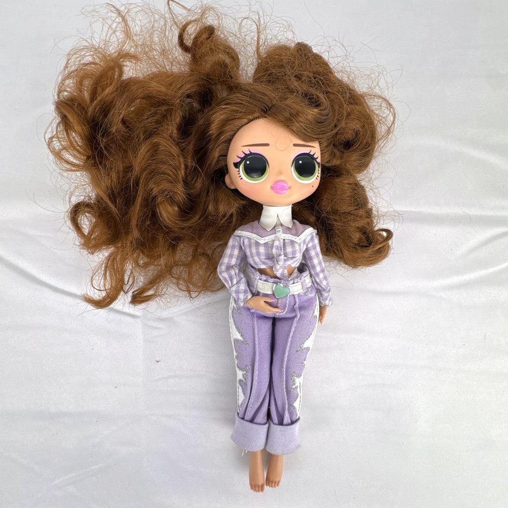 MGA L.O.L. Surprise! O.M.G. Remix Lonestar fashion doll wearing a purple western cowgirl outfit