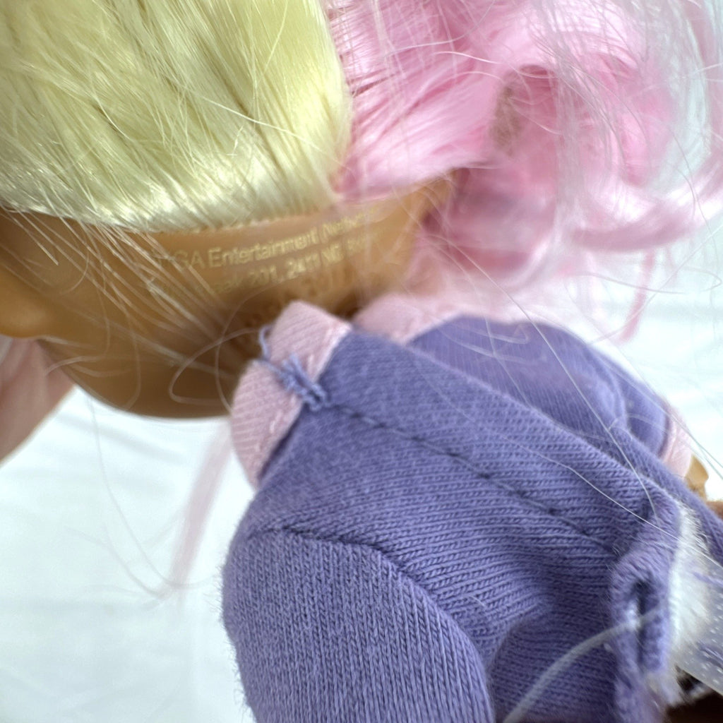 MGA Entertainment LOL Surprise OMG Candylicious fashion doll in mixed outfit with pastel hair