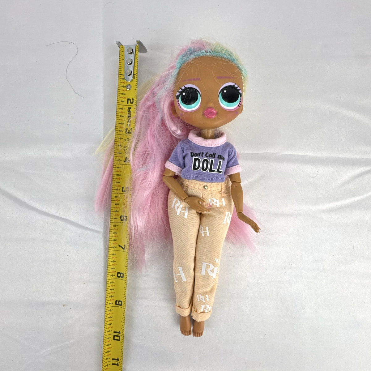 MGA Entertainment LOL Surprise OMG Candylicious fashion doll in mixed outfit with pastel hair