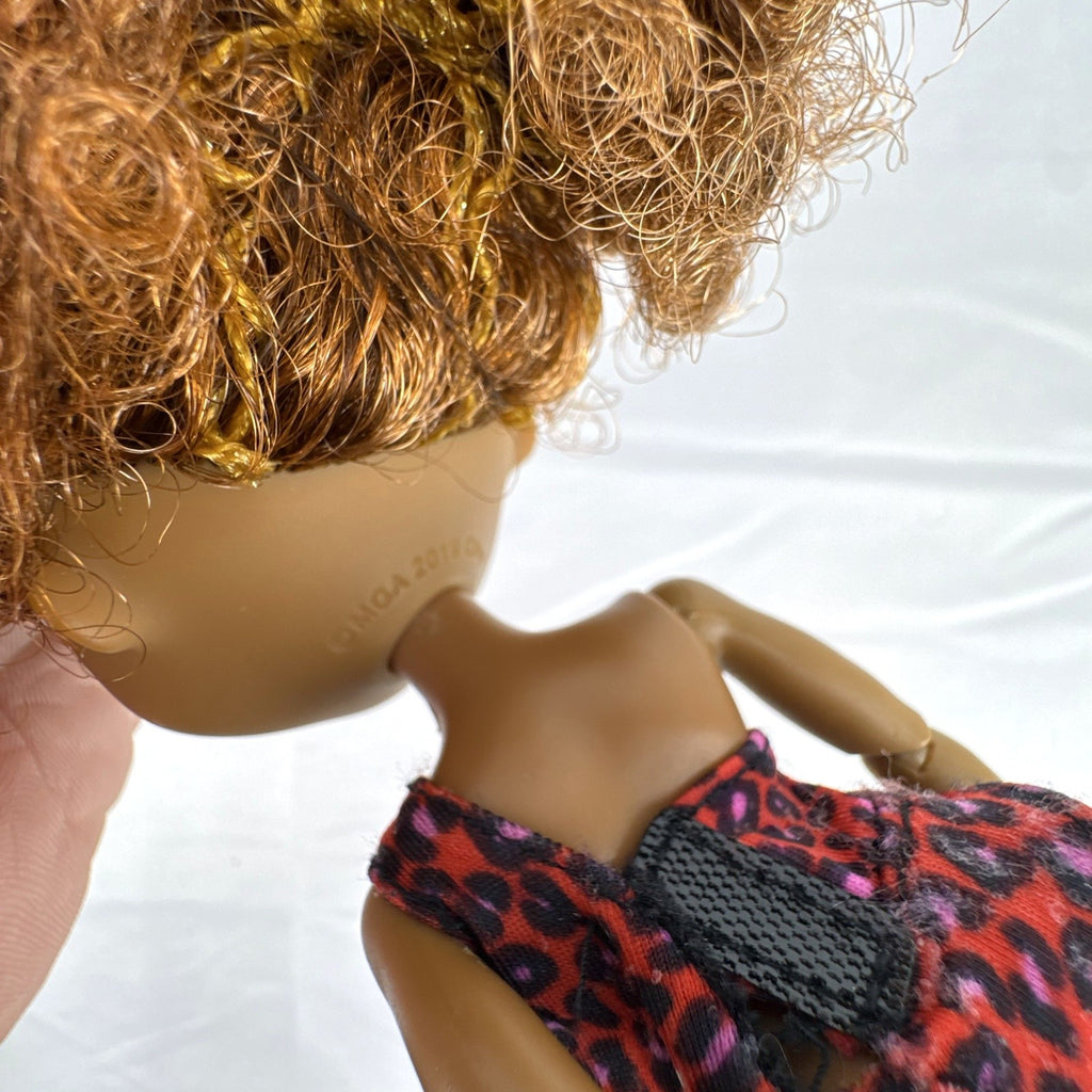 MGA LOL Surprise OMG Remix Ferocious 10-inch fashion doll wearing red leopard print bodysuit with tinsel curly hair