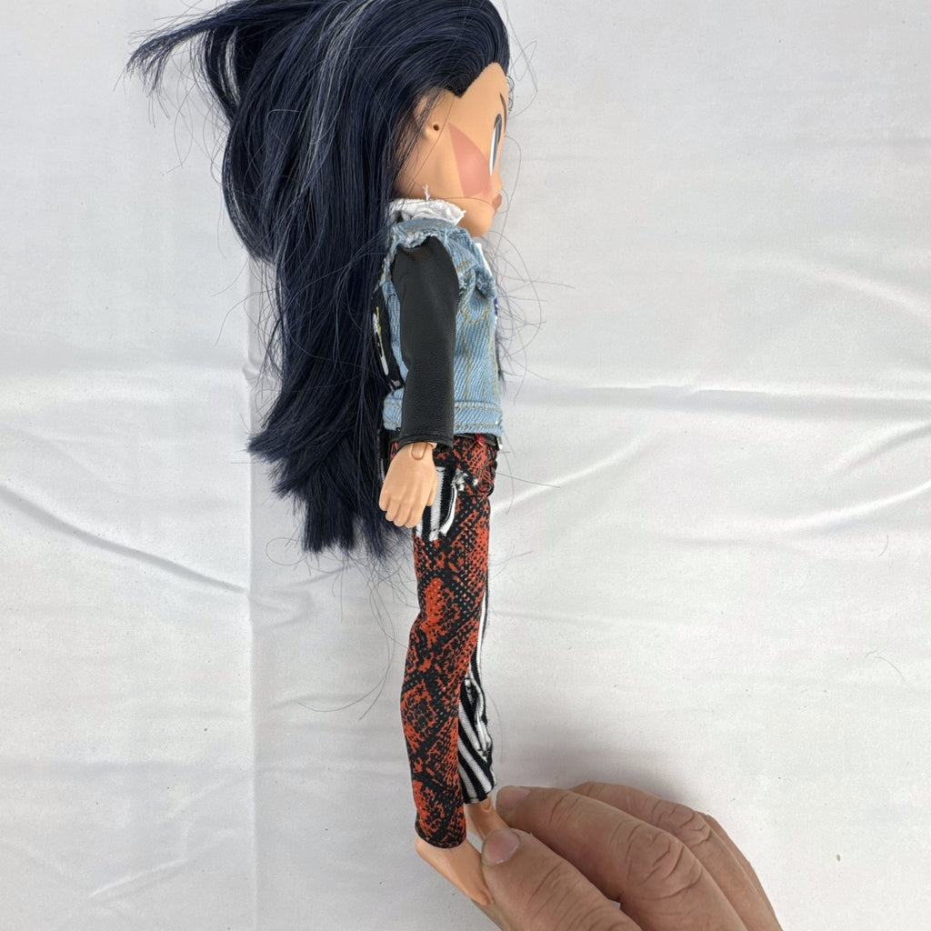 MGA L.O.L. Surprise! O.M.G. Remix Rocker Boi 10-inch articulated fashion doll in graphic tee, jacket, and pants