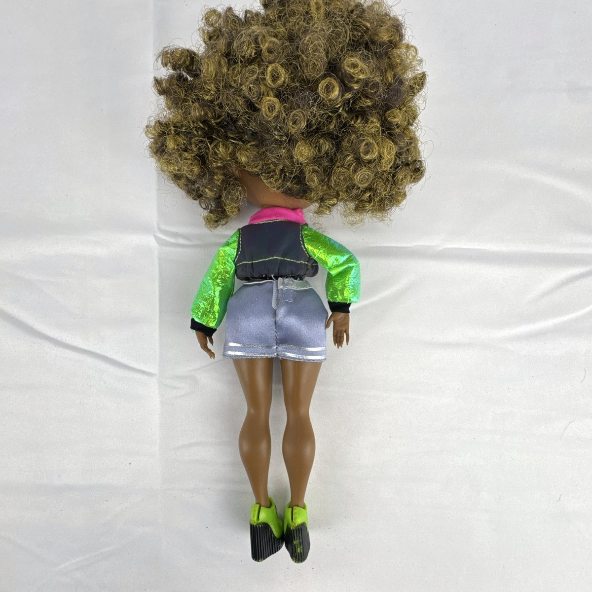 MGA Entertainment LOL Surprise OMG Royal Bee 10-inch doll in metallic outfit with lime green platform shoes