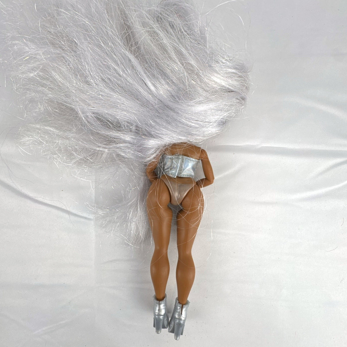 MGA LOL Surprise OMG Cosmic Nova fashion doll with floor-length silver hair and metallic corset