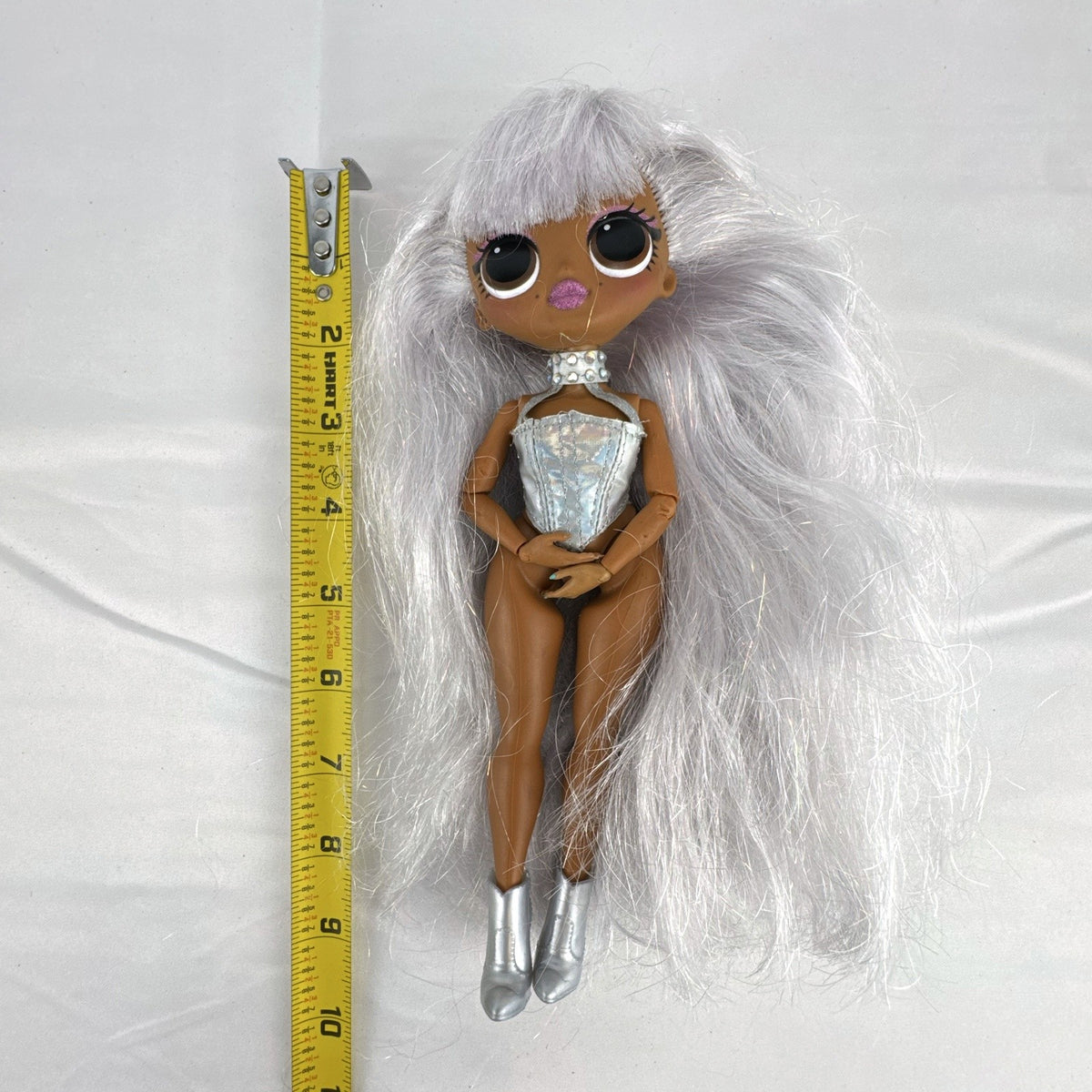 MGA LOL Surprise OMG Cosmic Nova fashion doll with floor-length silver hair and metallic corset