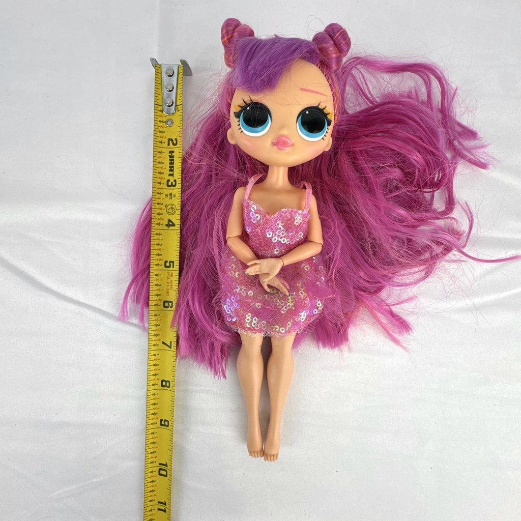 MGA Entertainment L.O.L. Surprise O.M.G. Lights Dazzle 10-inch fashion doll with pink hair in a sparkly sequin dress.